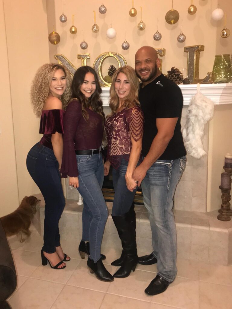 David J Harris Jr. with his wife and daughters