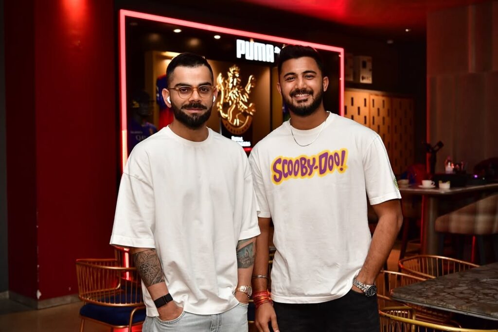 Saurav Chauhan  with Virat Kohli